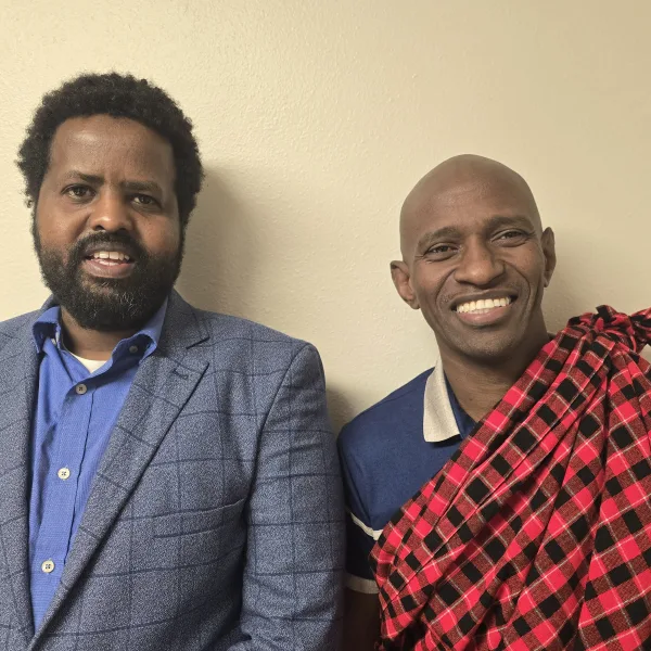 Amana Mbise (right) and his Leadership Anchorage mentee, Ahmed Hassan (LA26)